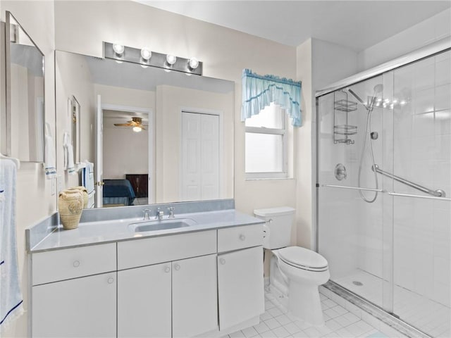 992 Seneca Ave, Sebastian, FL 32958 - bathroom featuring ensuite bath, a shower stall, vanity, and tile patterned flooring