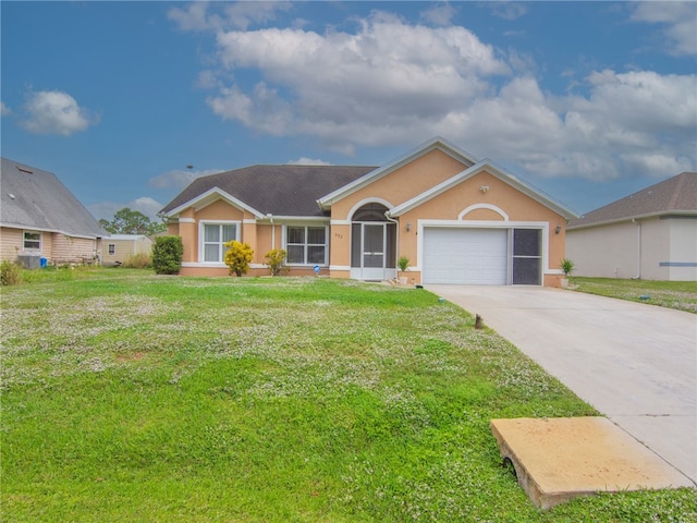 ranch-style house featuring a garage and a front yard