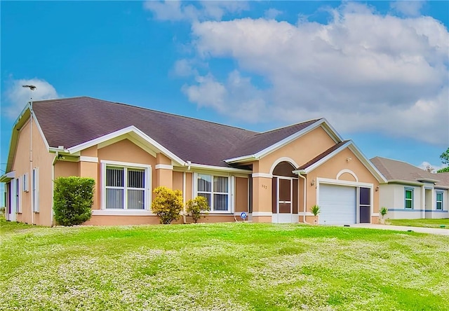 ranch-style house with stucco siding, a front yard, concrete driveway, and an attached garage