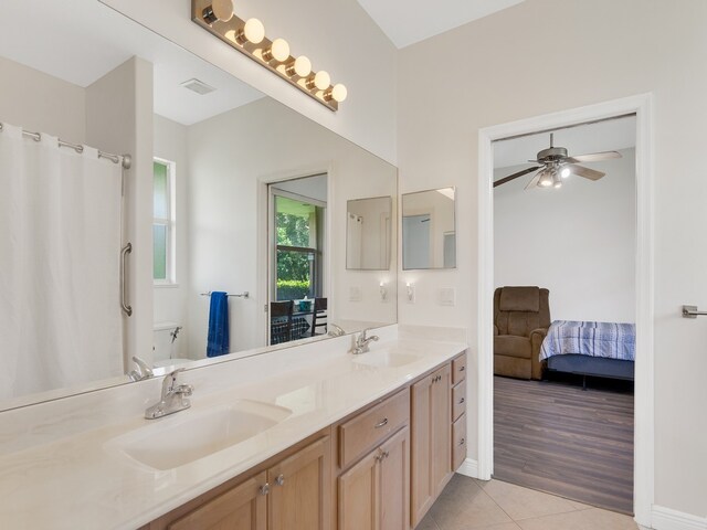 bathroom with vanity, wood-type flooring, and ceiling fan