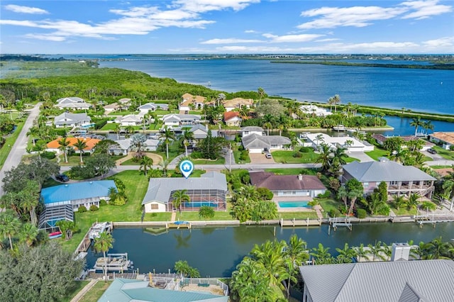 drone / aerial view with a water view