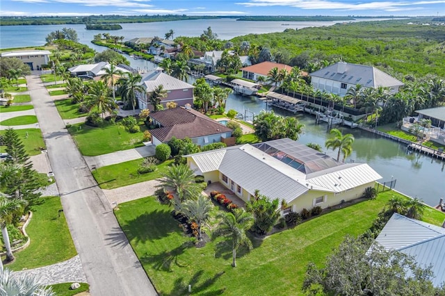 drone / aerial view with a water view