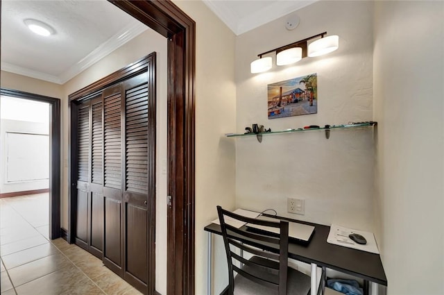 hall featuring light tile patterned floors and ornamental molding