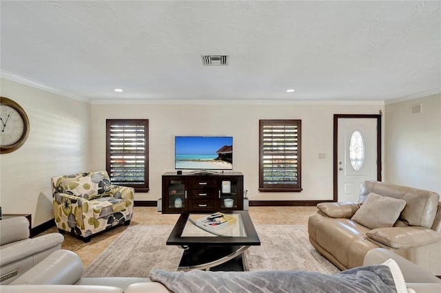 living room with ornamental molding