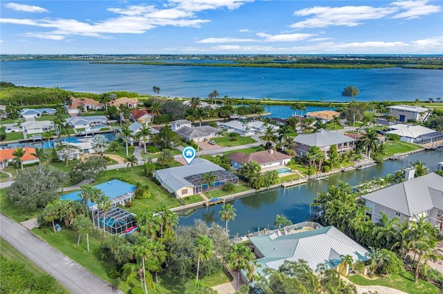 drone / aerial view featuring a water view