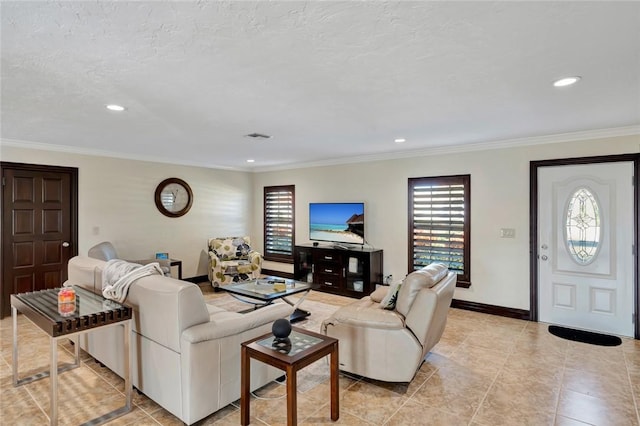 living room featuring a textured ceiling and ornamental molding