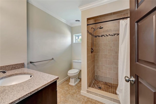 bathroom featuring curtained shower, tile patterned floors, crown molding, toilet, and vanity