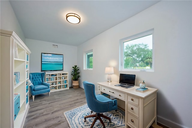 office area featuring light hardwood / wood-style flooring