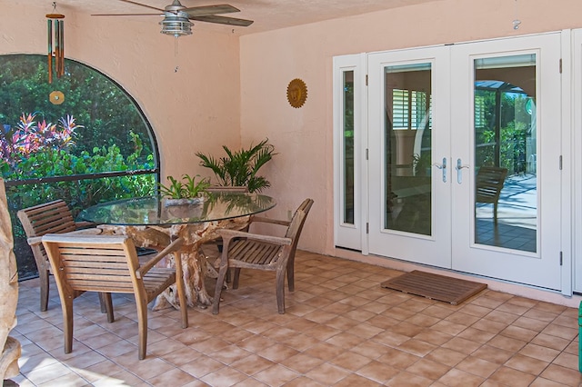 view of patio / terrace with ceiling fan and french doors