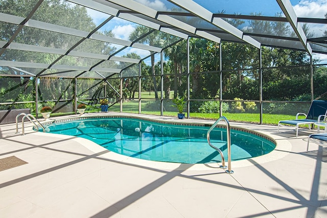 view of pool featuring a lanai and a patio area