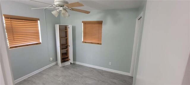 unfurnished bedroom with ceiling fan