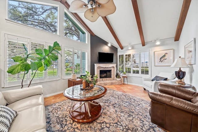 living room featuring tile patterned floors, beam ceiling, high vaulted ceiling, and a fireplace