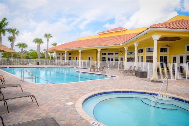 view of pool featuring a patio area and ceiling fan