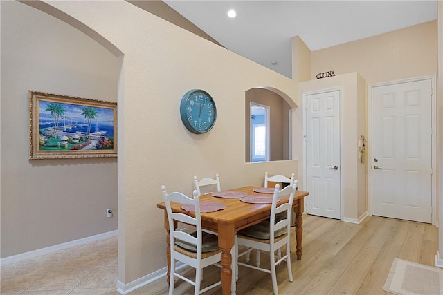 dining space with light wood-type flooring