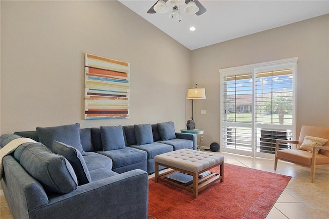 tiled living room featuring lofted ceiling and ceiling fan