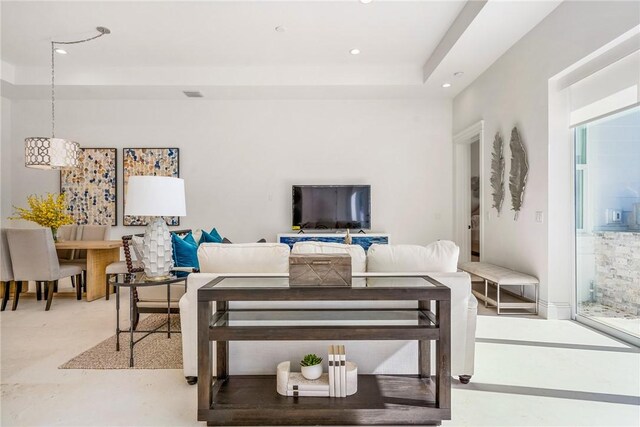 10 Strand Dr, Vero Beach, FL 32963 - living room featuring recessed lighting and a tray ceiling