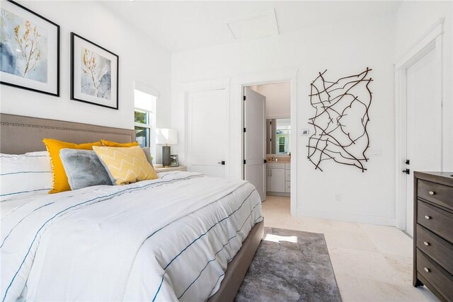 10 Strand Dr, Vero Beach, FL 32963 - bedroom with ensuite bath and attic access