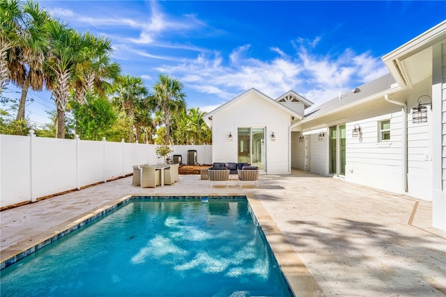 view of pool with an outdoor hangout area and a patio area