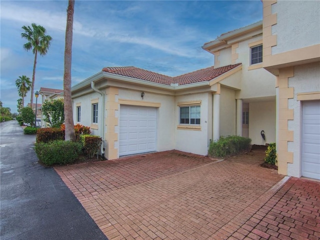 view of front of property featuring a garage