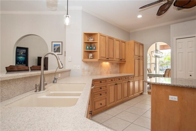 bathroom featuring tile patterned flooring, vanity, and ceiling fan