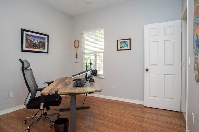 exercise room featuring ceiling fan, a healthy amount of sunlight, and carpet floors