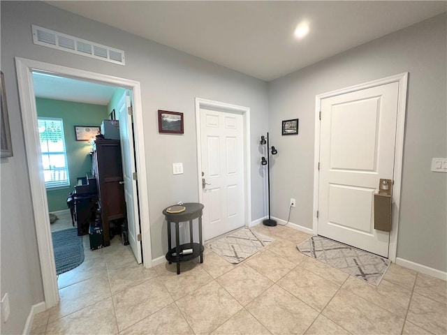 4173 Keeson Cir, Vero Beach, FL 32967 - foyer entrance featuring light tile patterned flooring and baseboards