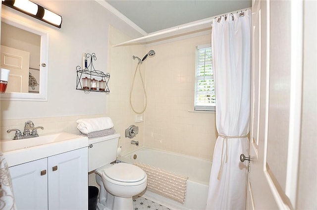 full bathroom featuring shower / tub combo, vanity, and toilet