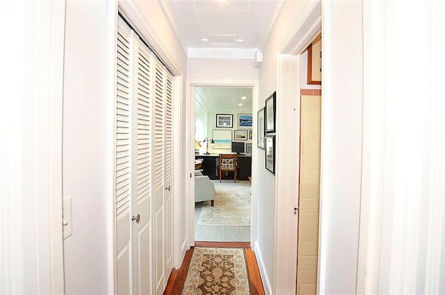 hallway featuring hardwood / wood-style flooring