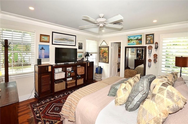 bedroom with ceiling fan, ornamental molding, dark hardwood / wood-style floors, and multiple windows