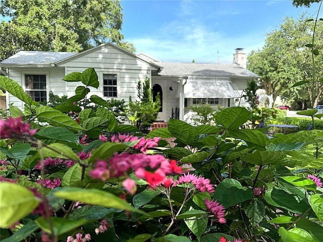 bungalow-style house featuring a garage