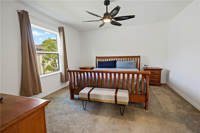 8646 102nd Ave, Vero Beach, FL 32967 - bedroom featuring carpet flooring, baseboards, and a ceiling fan