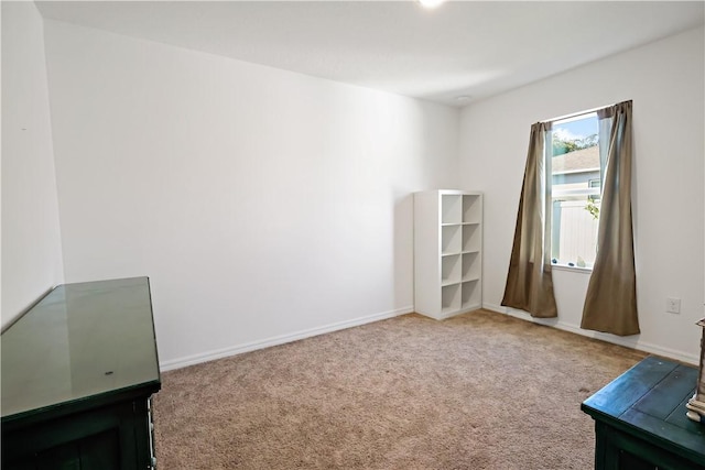 8646 102nd Ave, Vero Beach, FL 32967 - empty room featuring carpet flooring and baseboards