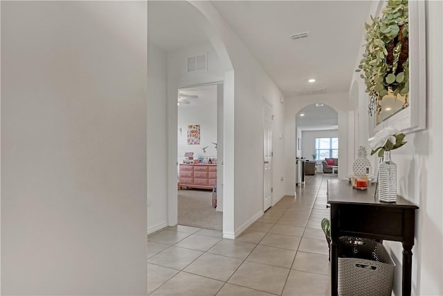 hallway with light tile patterned floors