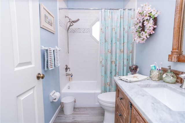 full bathroom with vanity, hardwood / wood-style floors, shower / bathtub combination with curtain, and toilet