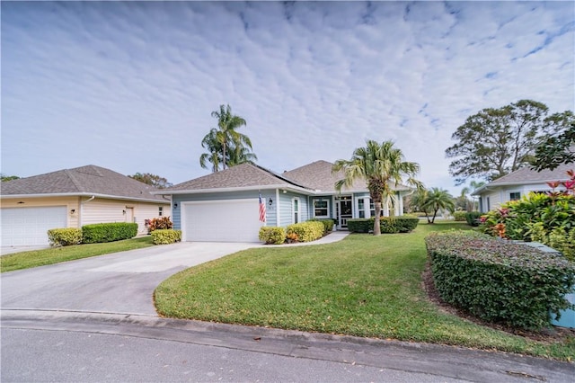 ranch-style house with a garage and a front lawn