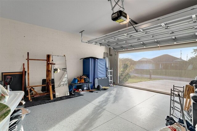 garage featuring a garage door opener