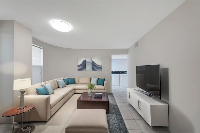 living room with light tile patterned floors