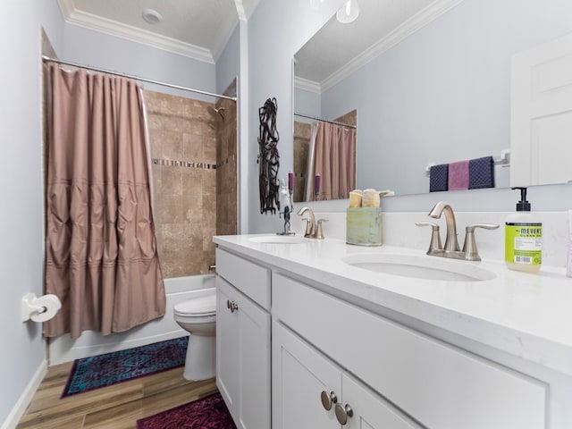 full bathroom with shower / bath combination with curtain, crown molding, vanity, hardwood / wood-style floors, and toilet