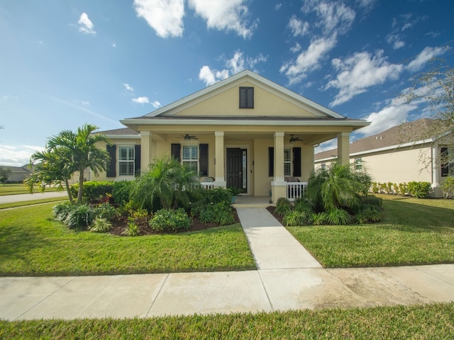 view of front facade with a front lawn and a porch