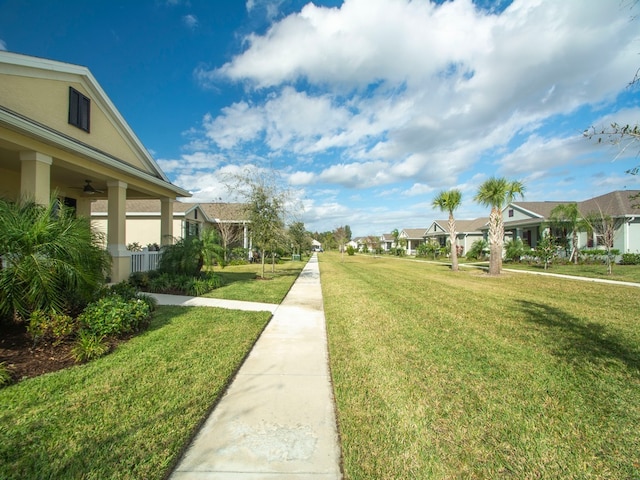 view of community featuring a lawn