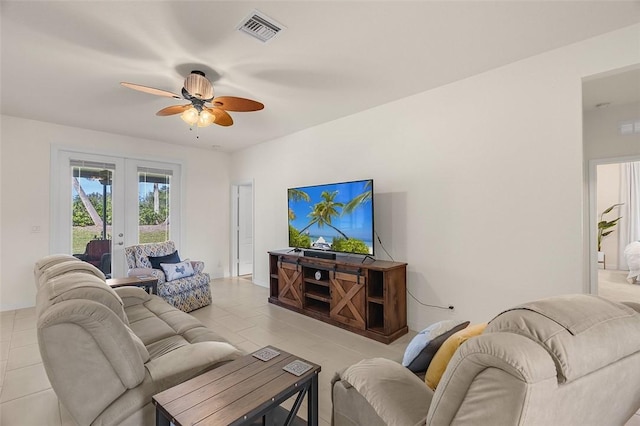 living room with french doors and ceiling fan