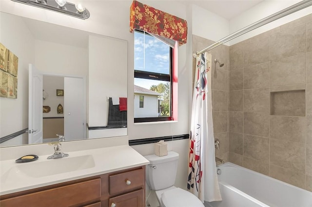 full bathroom with vanity, toilet, and shower / bath combo