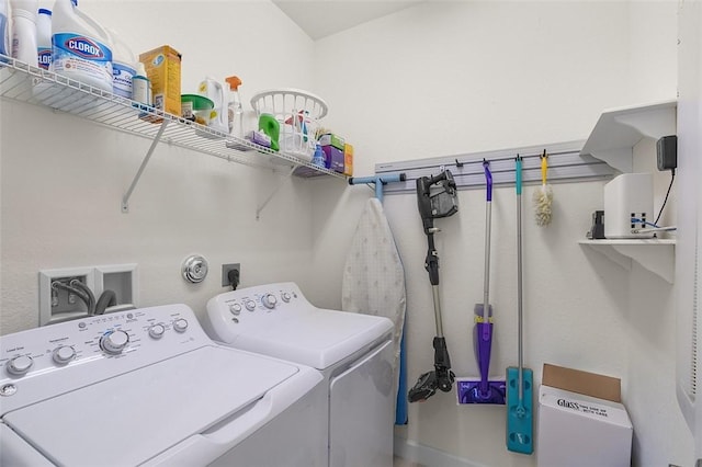 laundry room featuring washing machine and dryer