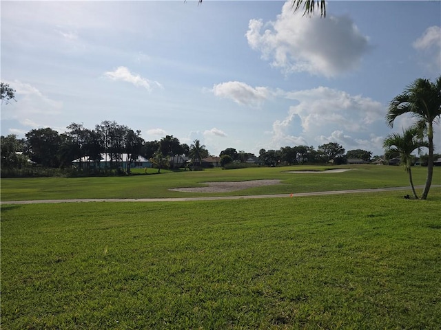 25 Pine Arbor Ln Unit 104, Vero Beach, FL 32962 - view of community featuring golf course view and a yard