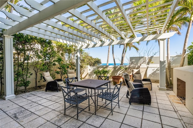 view of patio featuring a pergola