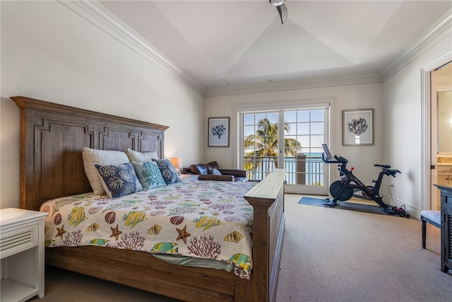 carpeted bedroom with ornamental molding and access to outside