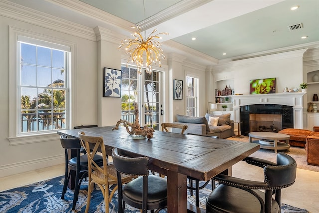 tiled dining room featuring an inviting chandelier and crown molding