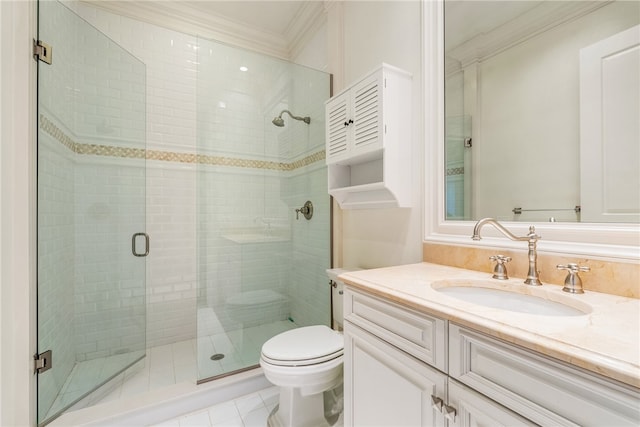 bathroom featuring vanity, tile patterned floors, crown molding, toilet, and a shower with shower door