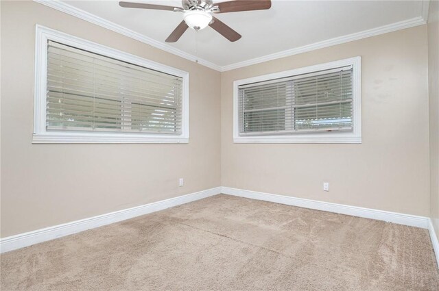 1751 5th Ct, Vero Beach, FL 32960 - spare room featuring carpet floors, baseboards, ornamental molding, and ceiling fan