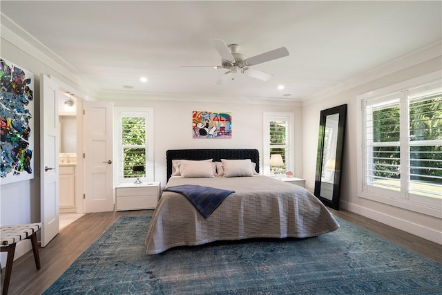 bedroom with baseboards, ceiling fan, wood finished floors, crown molding, and recessed lighting